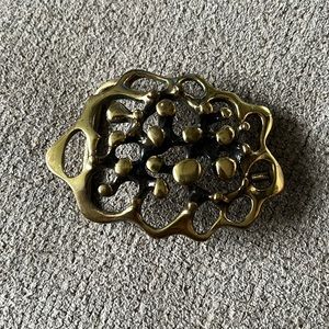 Vintage modernist Jack Boyd spore belt buckle San Diego